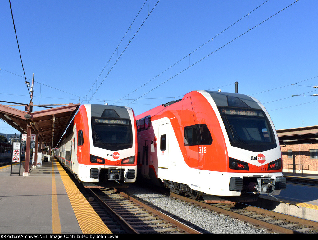 Two Caltrain electric emu sets keep each other company at SJC